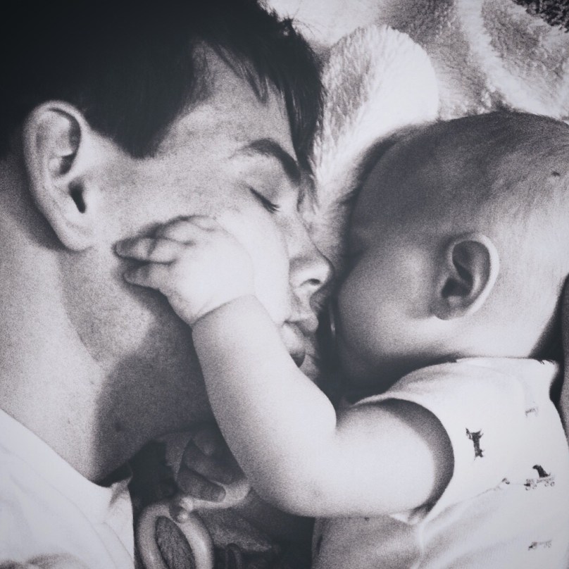 Snuggles with my daddy.